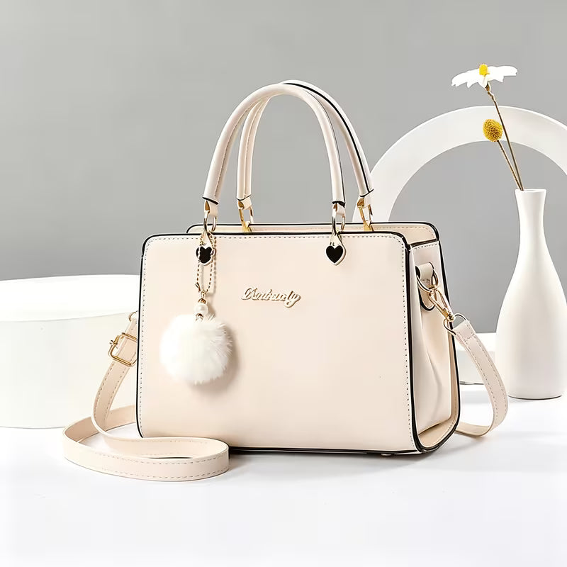 Sanika - Sac à Main Avec Breloque Pompon et Bandoulière