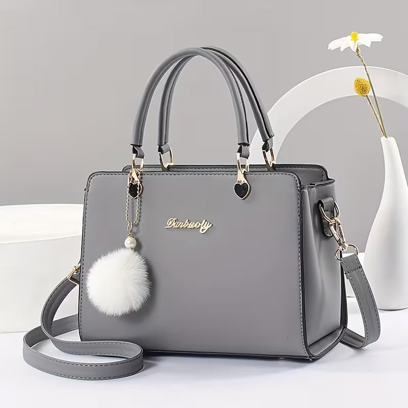 Sanika - Sac à Main Avec Breloque Pompon et Bandoulière
