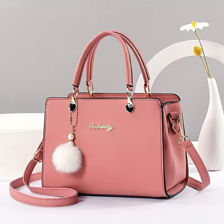 Sanika - Sac à Main Avec Breloque Pompon et Bandoulière